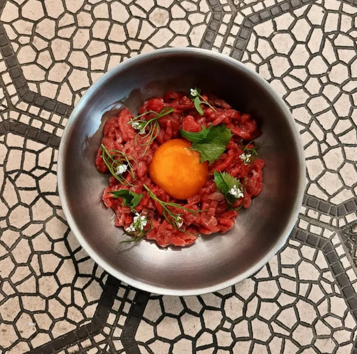 Beef tartare with cured egg yolk